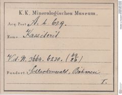 Etiketten zu Kassiterit (NHMW-MIN-Ah629)